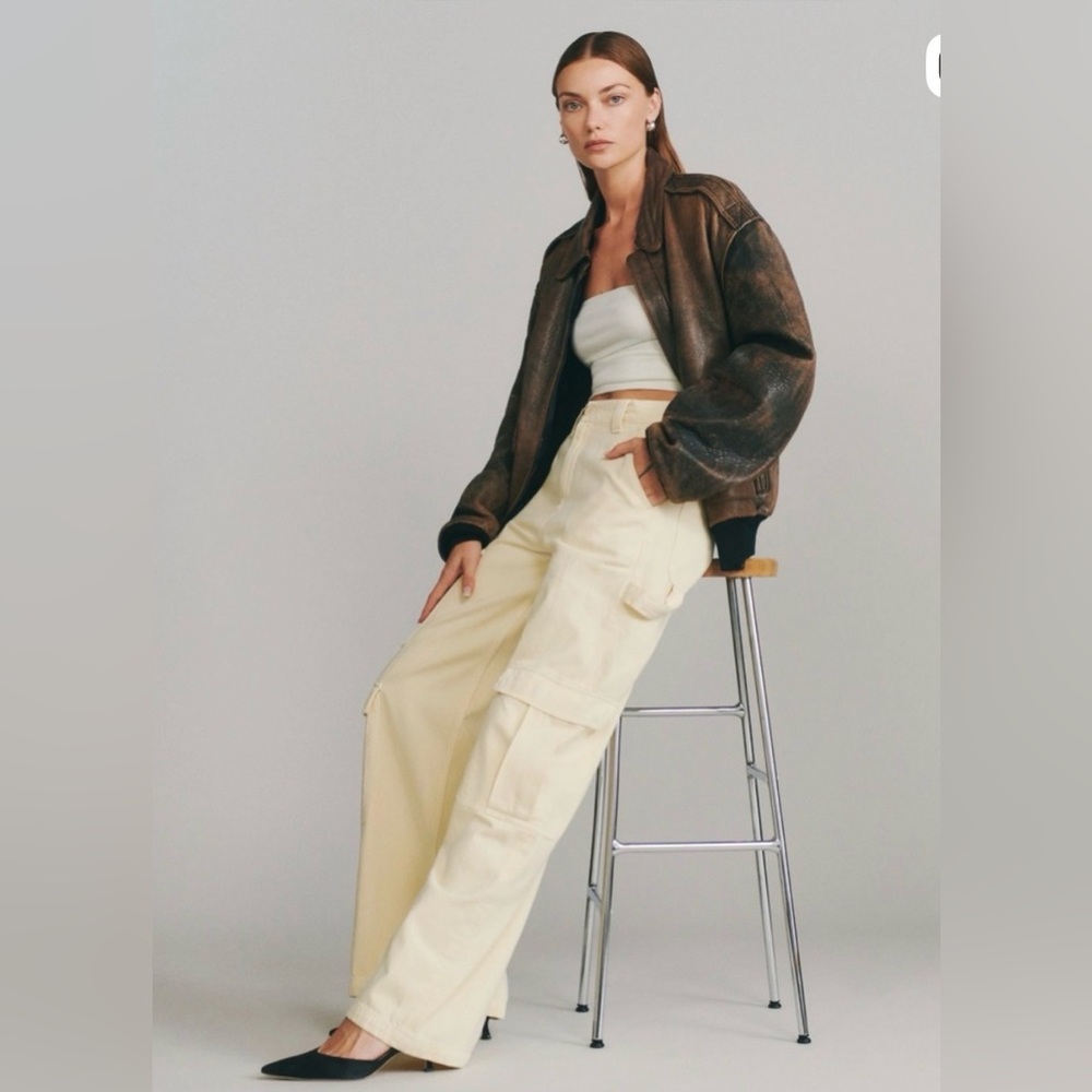 Reformation ivory “Bailey” dressy cotton cargo pants.